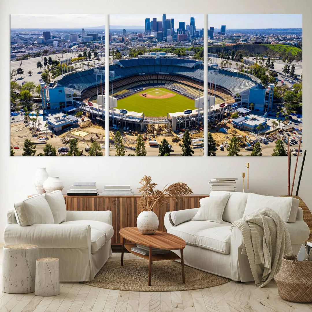 Aerial view of Dodger Stadium, home to the Los Angeles Dodgers, set against a city skyline and featured as a striking wall art piece across three framed panels, offering a gallery-quality finish.