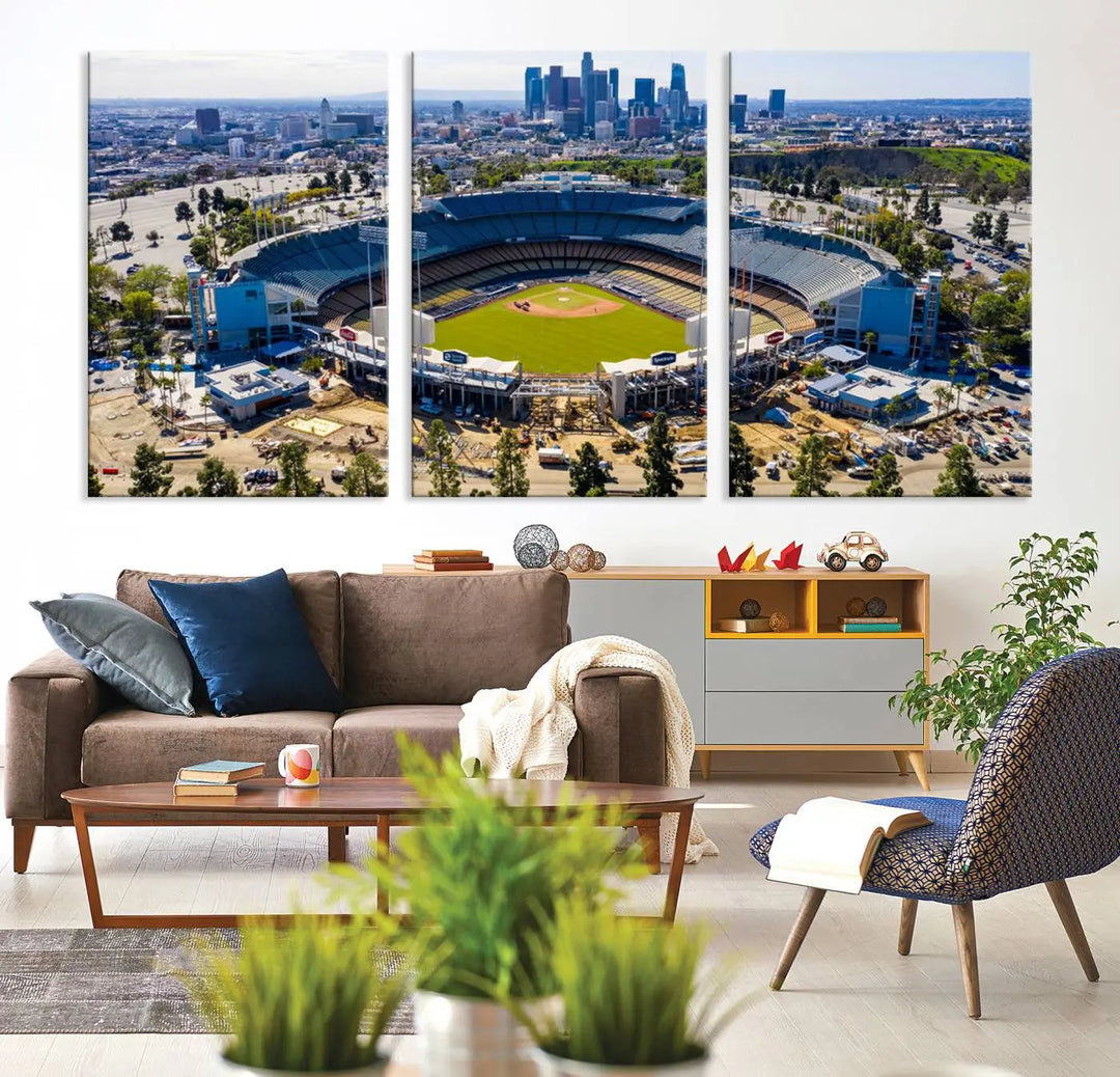 Aerial view of Dodger Stadium, home to the Los Angeles Dodgers, set against a city skyline and featured as a striking wall art piece across three framed panels, offering a gallery-quality finish.