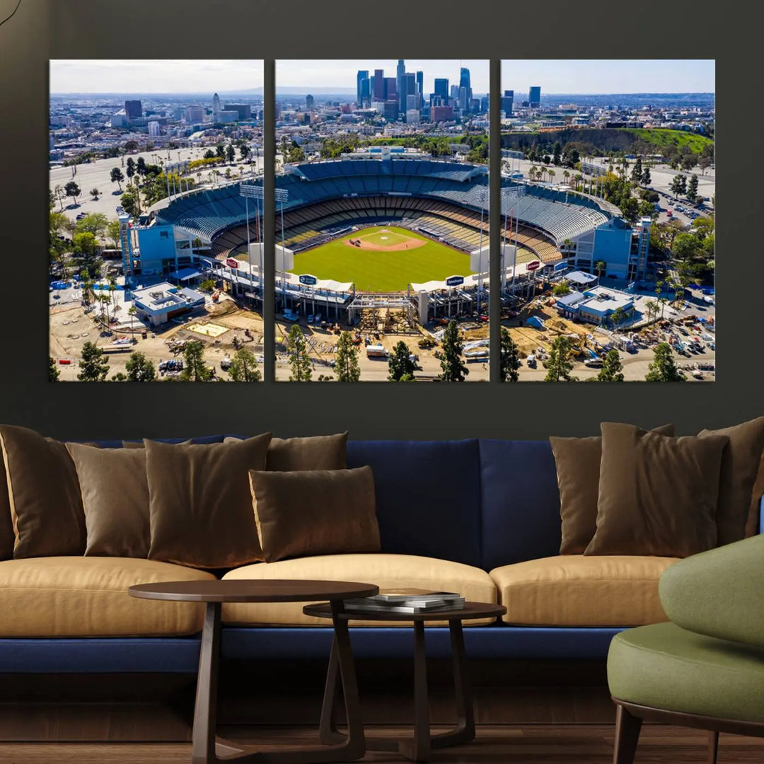 Aerial view of Dodger Stadium, home to the Los Angeles Dodgers, set against a city skyline and featured as a striking wall art piece across three framed panels, offering a gallery-quality finish.