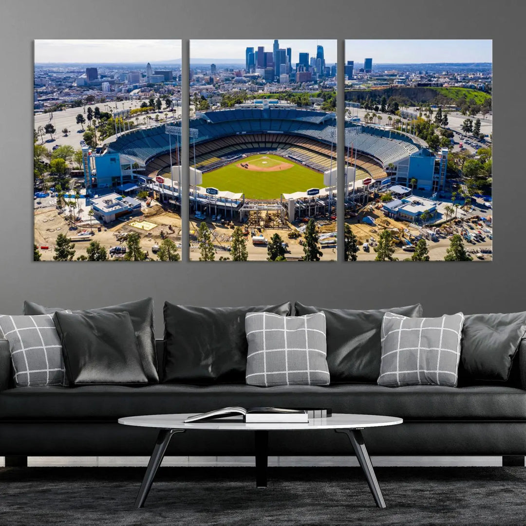 Aerial view of Dodger Stadium, home to the Los Angeles Dodgers, set against a city skyline and featured as a striking wall art piece across three framed panels, offering a gallery-quality finish.