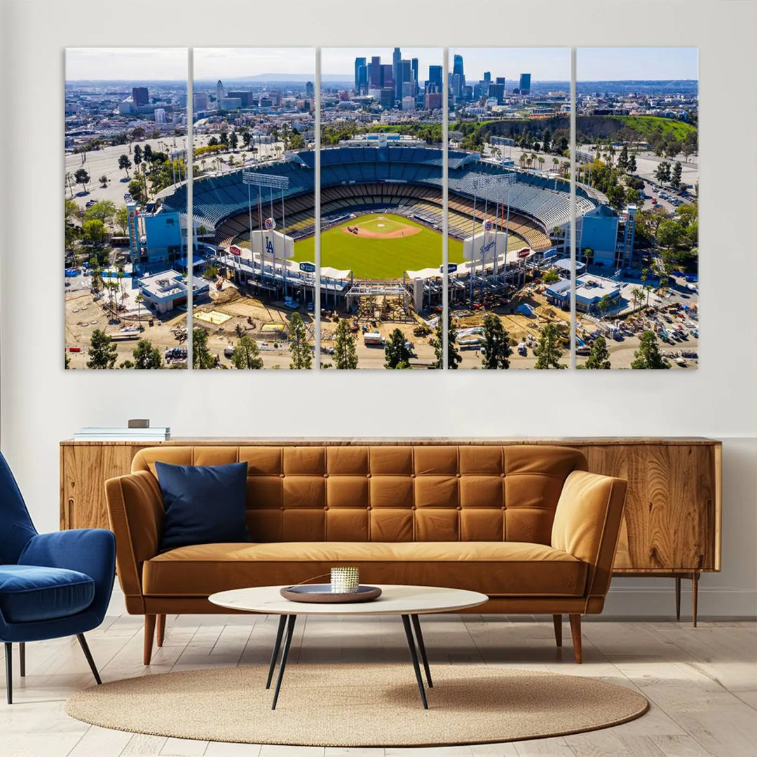 Aerial view of Dodger Stadium, home to the Los Angeles Dodgers, set against a city skyline and featured as a striking wall art piece across three framed panels, offering a gallery-quality finish.