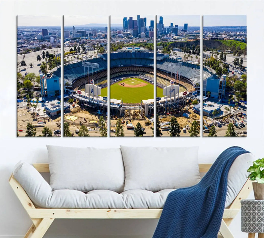 Aerial view of Dodger Stadium, home to the Los Angeles Dodgers, set against a city skyline and featured as a striking wall art piece across three framed panels, offering a gallery-quality finish.