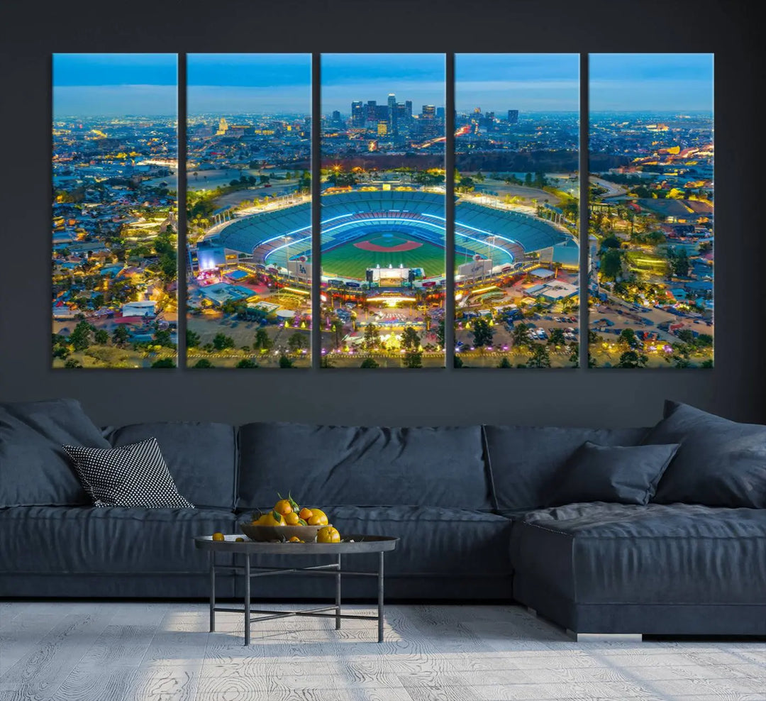 A Los Angeles Dodgers Dodger Stadium wall art canvas print, depicting a nighttime view of the stadium, is showcased in a modern living room.