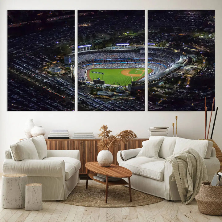 A stunning triptych of Dodger Stadium, captured in a brightly lit aerial view at night, adorns the wall. This Los Angeles Dodgers wall art is crafted with a gallery-quality finish on premium canvas.