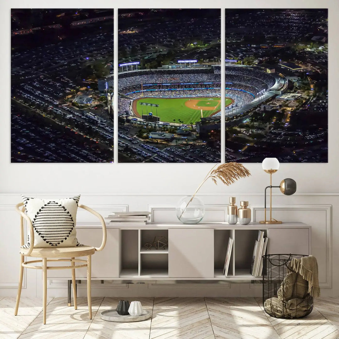 A stunning triptych of Dodger Stadium, captured in a brightly lit aerial view at night, adorns the wall. This Los Angeles Dodgers wall art is crafted with a gallery-quality finish on premium canvas.