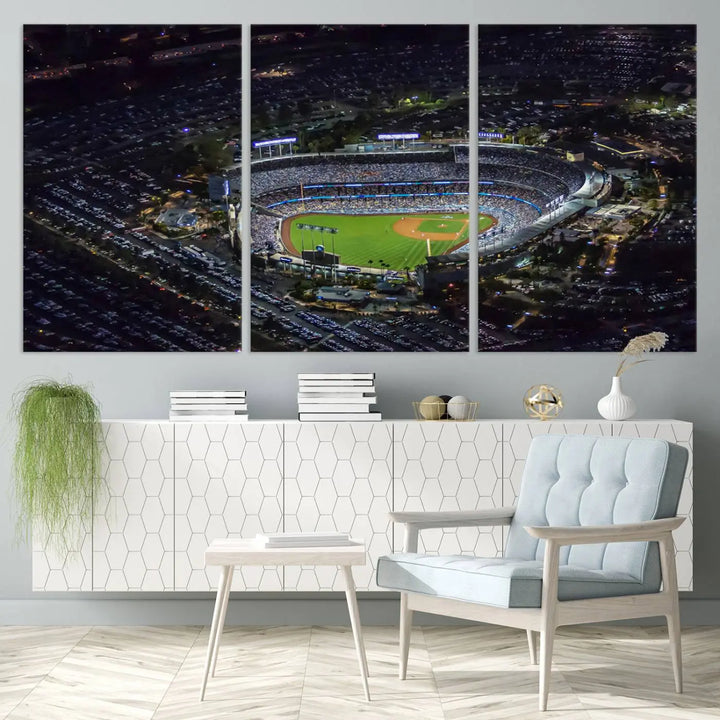 A stunning triptych of Dodger Stadium, captured in a brightly lit aerial view at night, adorns the wall. This Los Angeles Dodgers wall art is crafted with a gallery-quality finish on premium canvas.