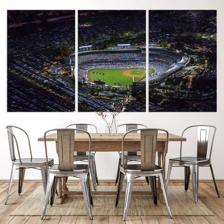 A stunning triptych of Dodger Stadium, captured in a brightly lit aerial view at night, adorns the wall. This Los Angeles Dodgers wall art is crafted with a gallery-quality finish on premium canvas.