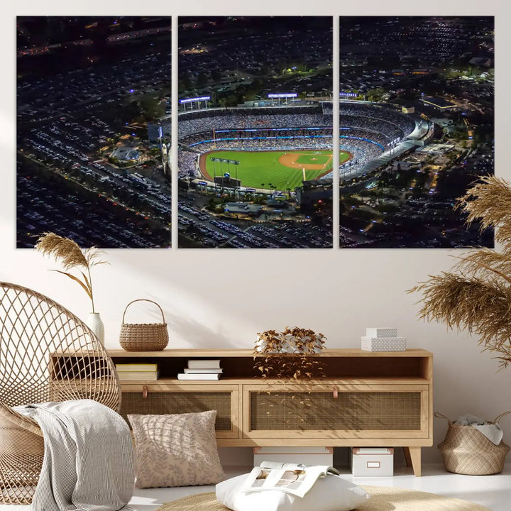 A stunning triptych of Dodger Stadium, captured in a brightly lit aerial view at night, adorns the wall. This Los Angeles Dodgers wall art is crafted with a gallery-quality finish on premium canvas.