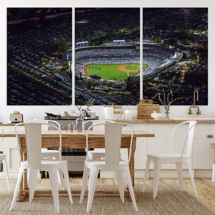 A stunning triptych of Dodger Stadium, captured in a brightly lit aerial view at night, adorns the wall. This Los Angeles Dodgers wall art is crafted with a gallery-quality finish on premium canvas.