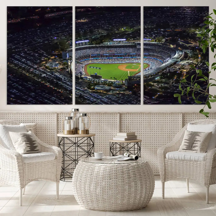 A stunning triptych of Dodger Stadium, captured in a brightly lit aerial view at night, adorns the wall. This Los Angeles Dodgers wall art is crafted with a gallery-quality finish on premium canvas.