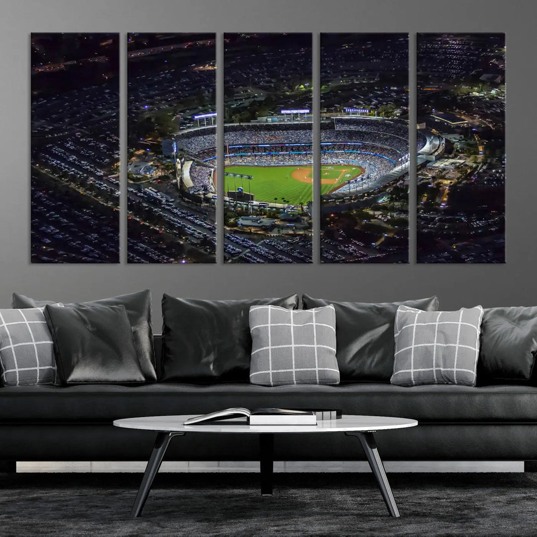 A stunning triptych of Dodger Stadium, captured in a brightly lit aerial view at night, adorns the wall. This Los Angeles Dodgers wall art is crafted with a gallery-quality finish on premium canvas.