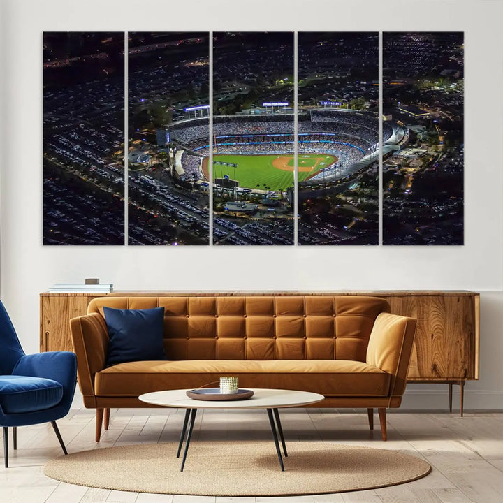 A stunning triptych of Dodger Stadium, captured in a brightly lit aerial view at night, adorns the wall. This Los Angeles Dodgers wall art is crafted with a gallery-quality finish on premium canvas.