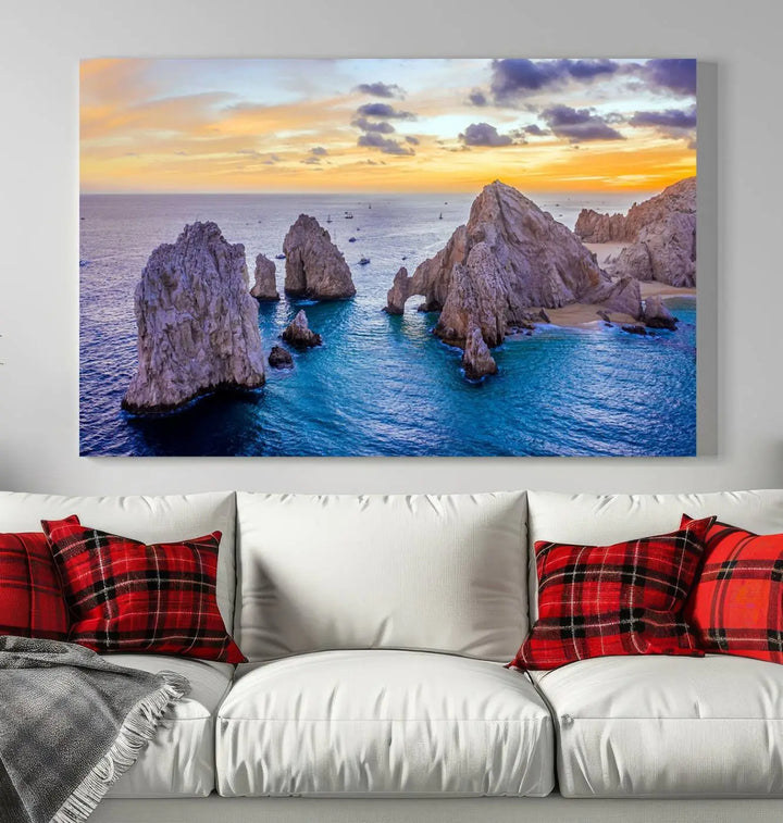 The living room features the Los Cabos San Lucas Ocean Canvas Wall Art Print, showcasing Mexico's Cabo Arch. Made from museum-quality canvases with UV-protective coating, this triptych wall art depicts a coastal scene at sunset and arrives ready to hang for effortless elegance.