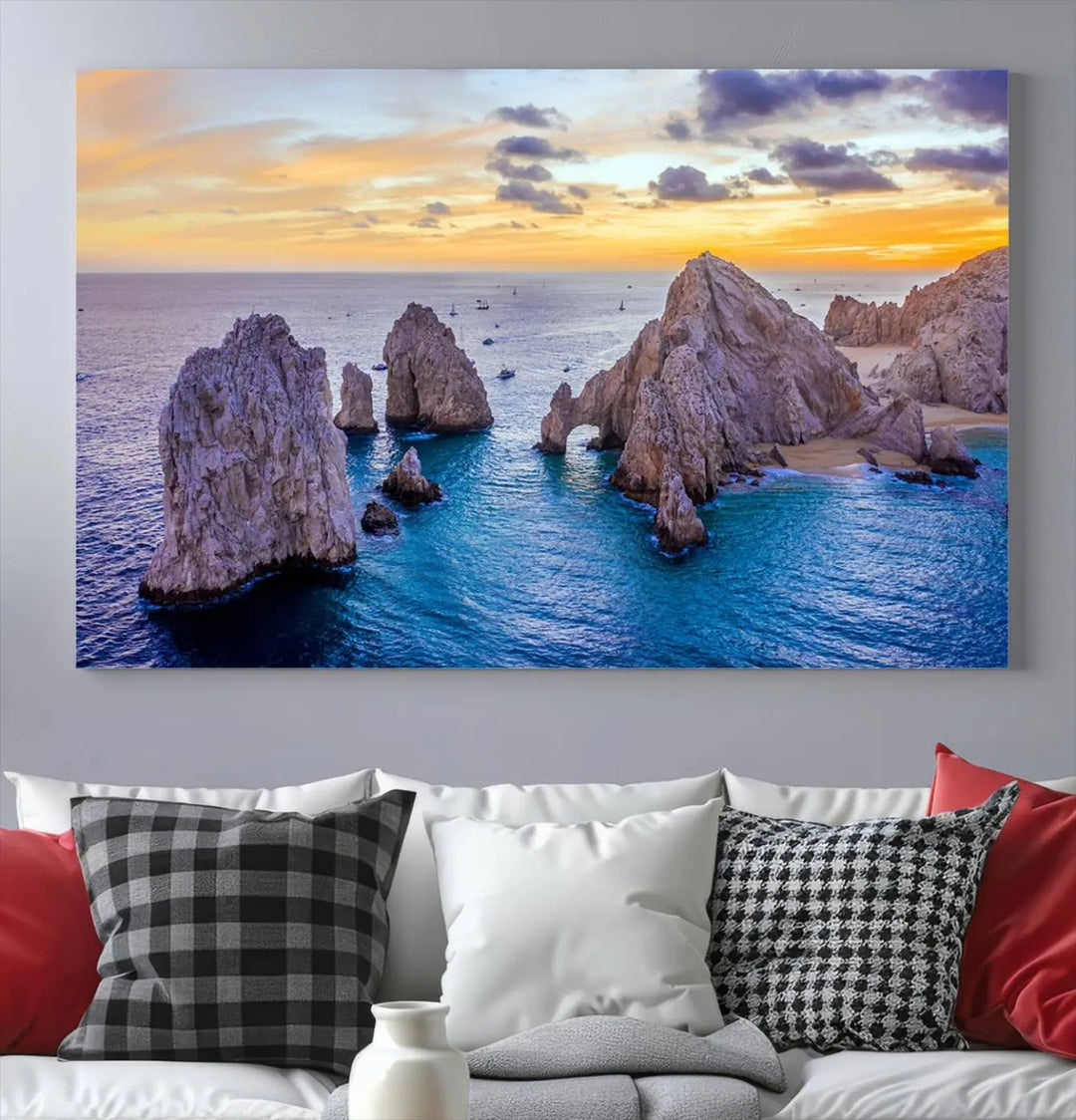 The living room features the Los Cabos San Lucas Ocean Canvas Wall Art Print, showcasing Mexico's Cabo Arch. Made from museum-quality canvases with UV-protective coating, this triptych wall art depicts a coastal scene at sunset and arrives ready to hang for effortless elegance.