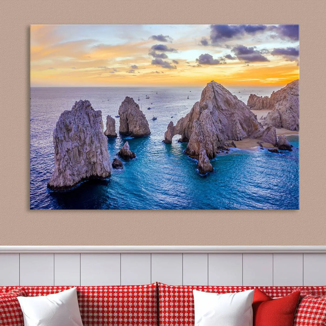 The living room features the Los Cabos San Lucas Ocean Canvas Wall Art Print, showcasing Mexico's Cabo Arch. Made from museum-quality canvases with UV-protective coating, this triptych wall art depicts a coastal scene at sunset and arrives ready to hang for effortless elegance.