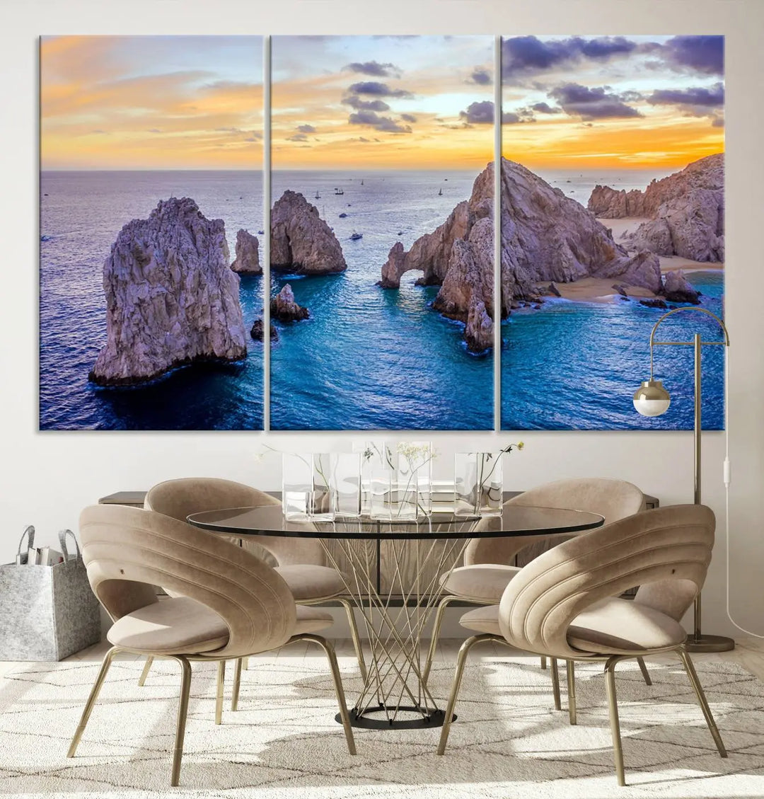 The living room features the Los Cabos San Lucas Ocean Canvas Wall Art Print, showcasing Mexico's Cabo Arch. Made from museum-quality canvases with UV-protective coating, this triptych wall art depicts a coastal scene at sunset and arrives ready to hang for effortless elegance.