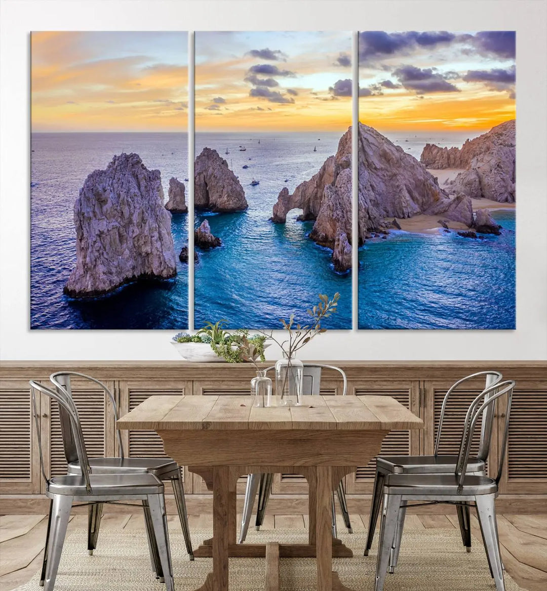 The living room features the Los Cabos San Lucas Ocean Canvas Wall Art Print, showcasing Mexico's Cabo Arch. Made from museum-quality canvases with UV-protective coating, this triptych wall art depicts a coastal scene at sunset and arrives ready to hang for effortless elegance.