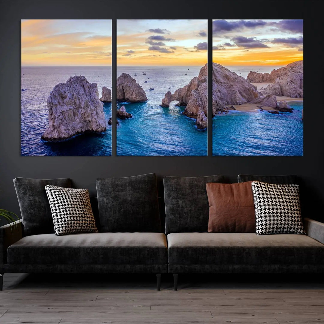 The living room features the Los Cabos San Lucas Ocean Canvas Wall Art Print, showcasing Mexico's Cabo Arch. Made from museum-quality canvases with UV-protective coating, this triptych wall art depicts a coastal scene at sunset and arrives ready to hang for effortless elegance.