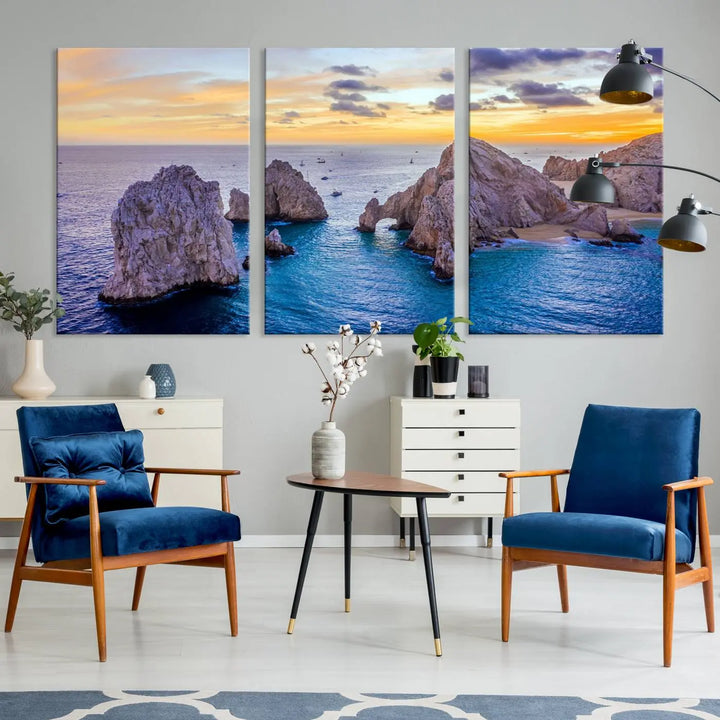 The living room features the Los Cabos San Lucas Ocean Canvas Wall Art Print, showcasing Mexico's Cabo Arch. Made from museum-quality canvases with UV-protective coating, this triptych wall art depicts a coastal scene at sunset and arrives ready to hang for effortless elegance.