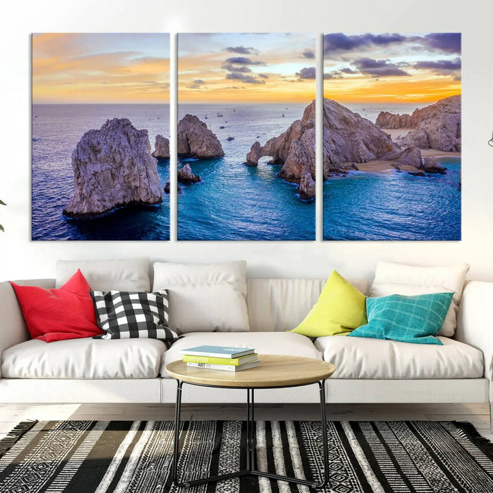 The living room features the Los Cabos San Lucas Ocean Canvas Wall Art Print, showcasing Mexico's Cabo Arch. Made from museum-quality canvases with UV-protective coating, this triptych wall art depicts a coastal scene at sunset and arrives ready to hang for effortless elegance.