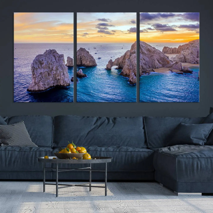 The living room features the Los Cabos San Lucas Ocean Canvas Wall Art Print, showcasing Mexico's Cabo Arch. Made from museum-quality canvases with UV-protective coating, this triptych wall art depicts a coastal scene at sunset and arrives ready to hang for effortless elegance.