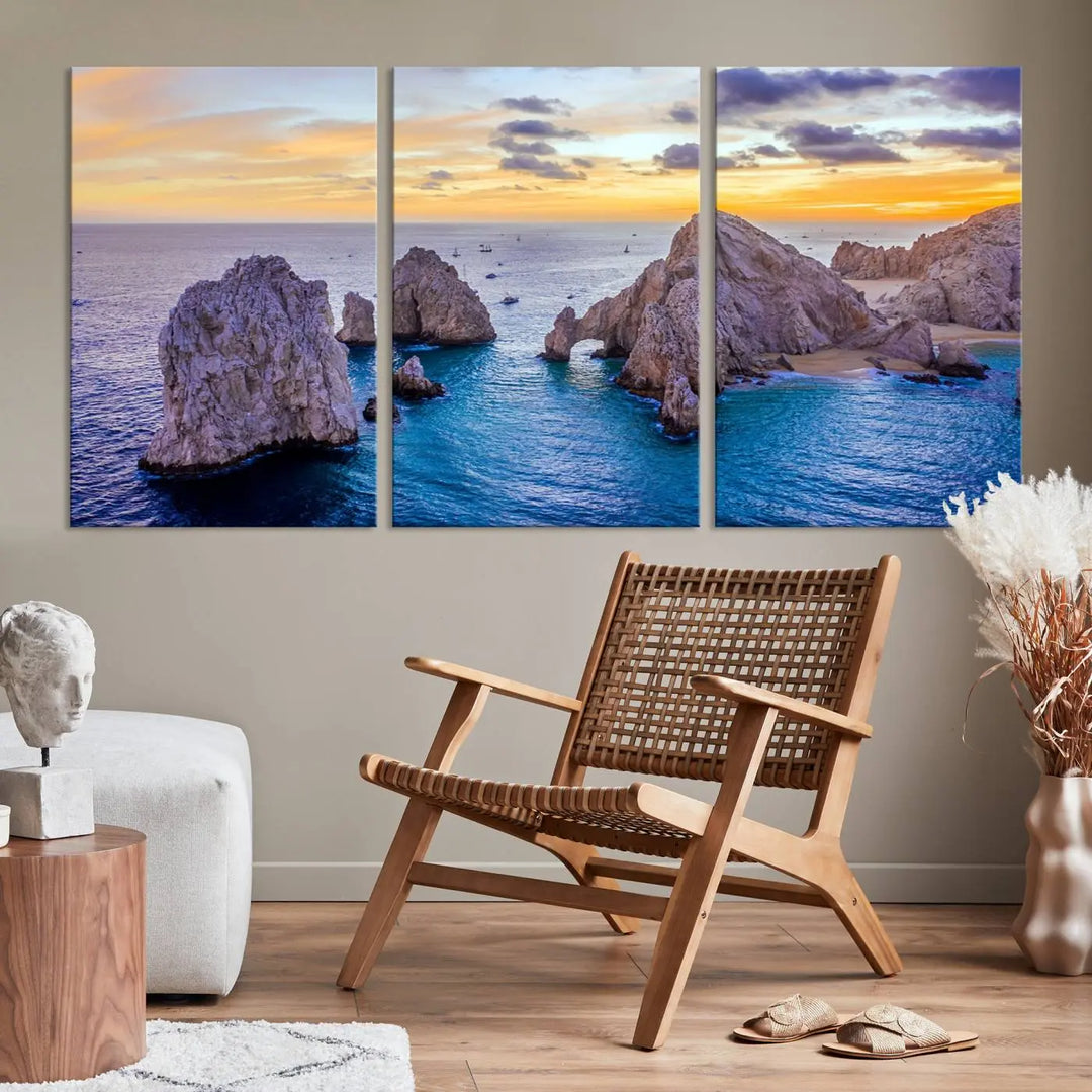 The living room features the Los Cabos San Lucas Ocean Canvas Wall Art Print, showcasing Mexico's Cabo Arch. Made from museum-quality canvases with UV-protective coating, this triptych wall art depicts a coastal scene at sunset and arrives ready to hang for effortless elegance.