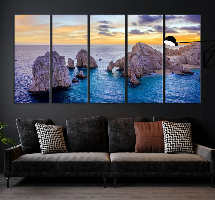 The living room features the Los Cabos San Lucas Ocean Canvas Wall Art Print, showcasing Mexico's Cabo Arch. Made from museum-quality canvases with UV-protective coating, this triptych wall art depicts a coastal scene at sunset and arrives ready to hang for effortless elegance.