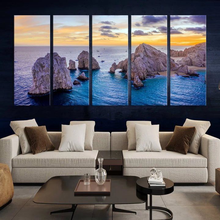 The living room features the Los Cabos San Lucas Ocean Canvas Wall Art Print, showcasing Mexico's Cabo Arch. Made from museum-quality canvases with UV-protective coating, this triptych wall art depicts a coastal scene at sunset and arrives ready to hang for effortless elegance.