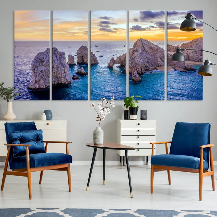 The living room features the Los Cabos San Lucas Ocean Canvas Wall Art Print, showcasing Mexico's Cabo Arch. Made from museum-quality canvases with UV-protective coating, this triptych wall art depicts a coastal scene at sunset and arrives ready to hang for effortless elegance.