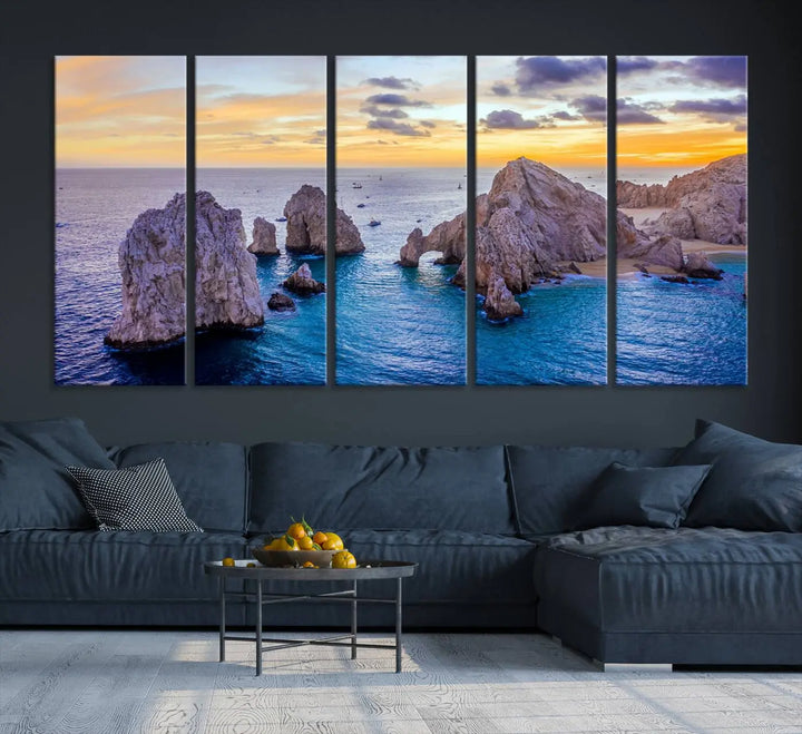 The living room features the Los Cabos San Lucas Ocean Canvas Wall Art Print, showcasing Mexico's Cabo Arch. Made from museum-quality canvases with UV-protective coating, this triptych wall art depicts a coastal scene at sunset and arrives ready to hang for effortless elegance.