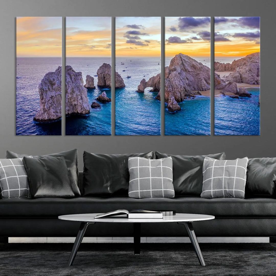 The living room features the Los Cabos San Lucas Ocean Canvas Wall Art Print, showcasing Mexico's Cabo Arch. Made from museum-quality canvases with UV-protective coating, this triptych wall art depicts a coastal scene at sunset and arrives ready to hang for effortless elegance.