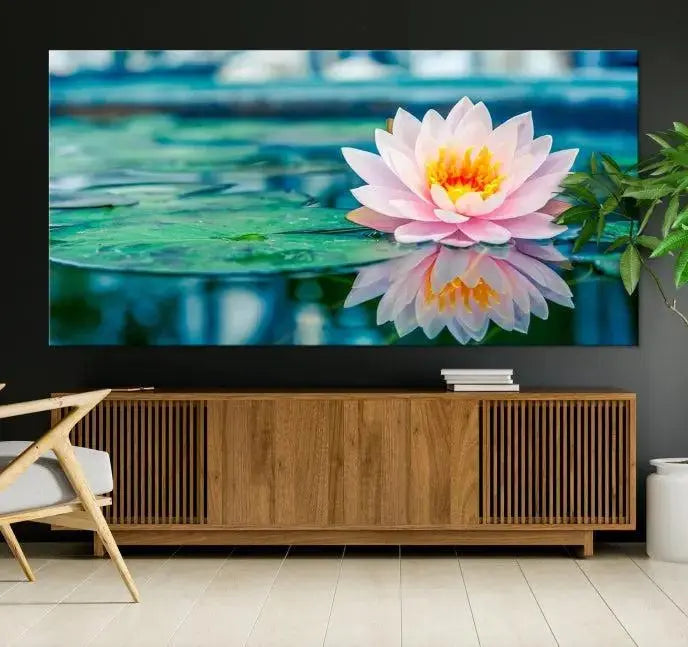 A museum-quality canvas triptych of a lotus flower graces the space, highlighting the beauty and craftsmanship of these Lotus Flower Wall Art Canvas Prints, which are delivered with free shipping.