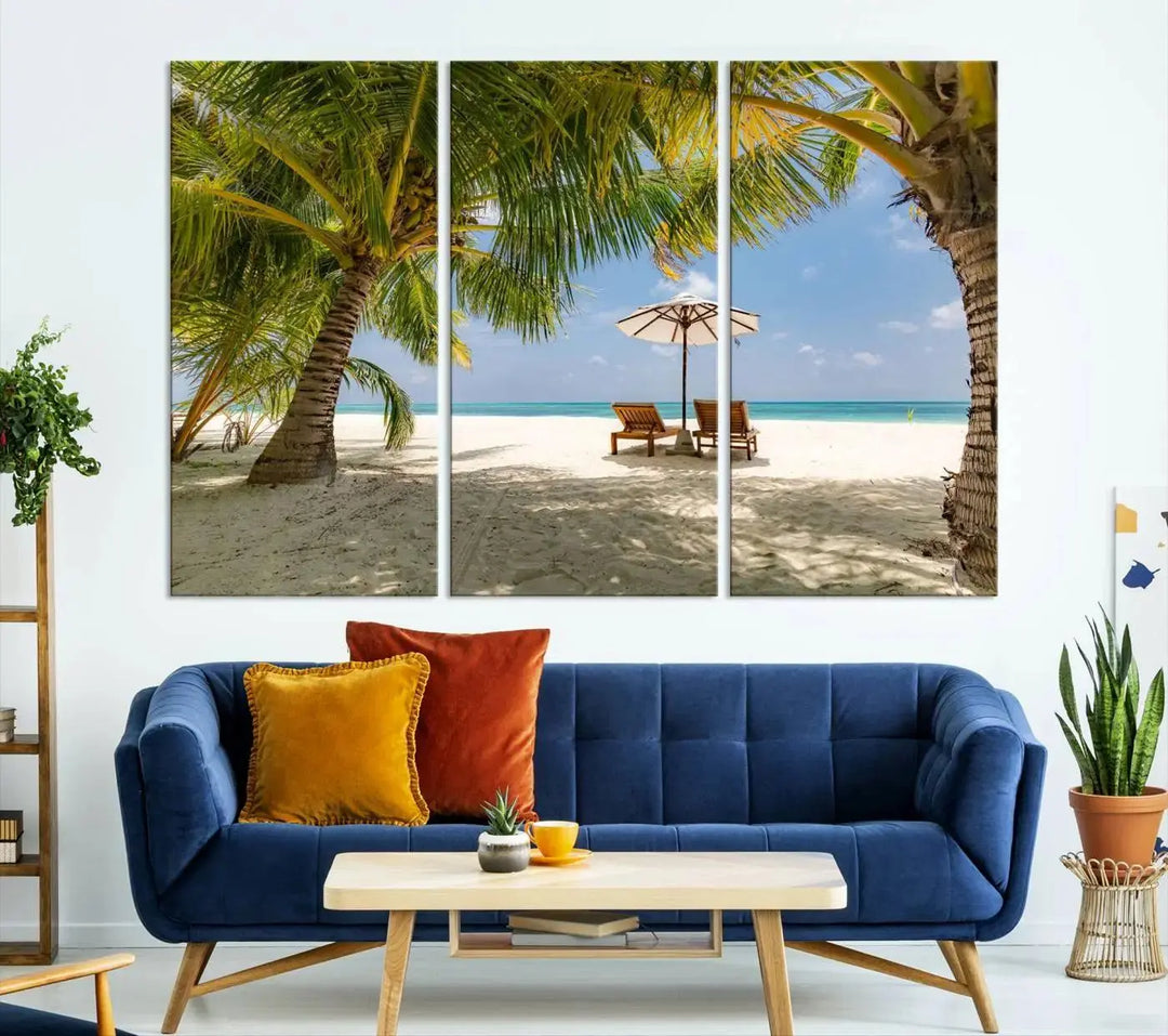 The living room features the "Lounge Chairs Palm Trees on Tropical Beach" canvas wall art print, offering museum-quality craftsmanship.