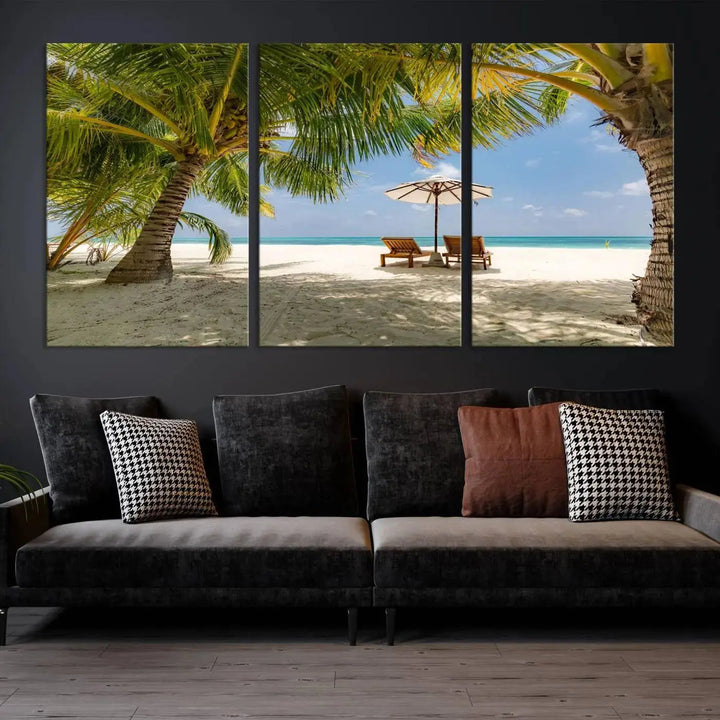 The living room features the "Lounge Chairs Palm Trees on Tropical Beach" canvas wall art print, offering museum-quality craftsmanship.