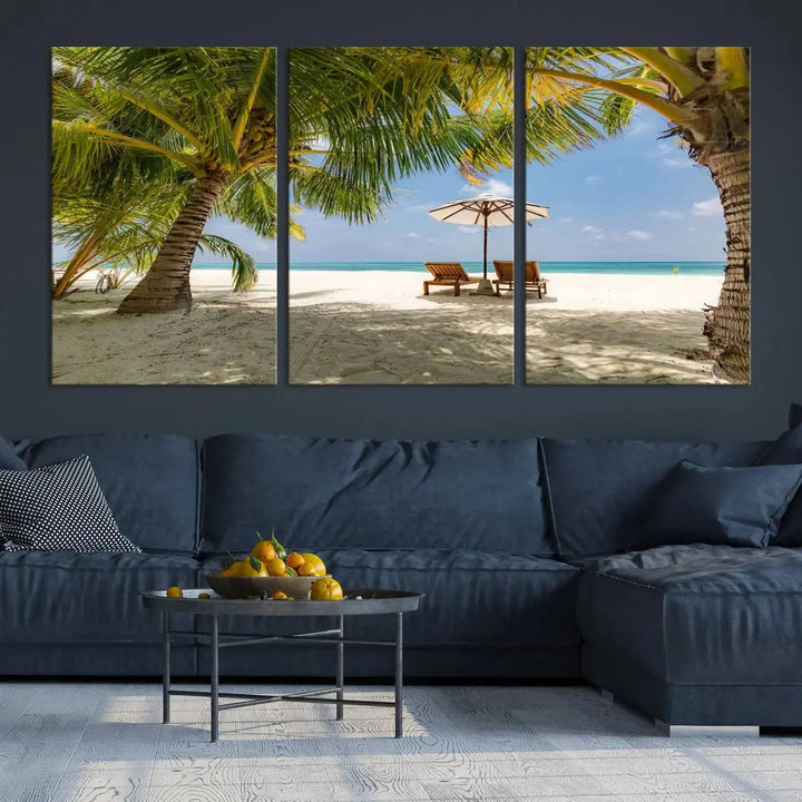 The living room features the "Lounge Chairs Palm Trees on Tropical Beach" canvas wall art print, offering museum-quality craftsmanship.