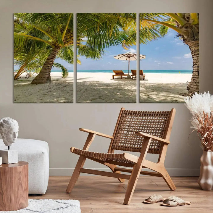 The living room features the "Lounge Chairs Palm Trees on Tropical Beach" canvas wall art print, offering museum-quality craftsmanship.