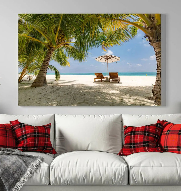 The living room features the "Lounge Chairs Palm Trees on Tropical Beach" canvas wall art print, offering museum-quality craftsmanship.