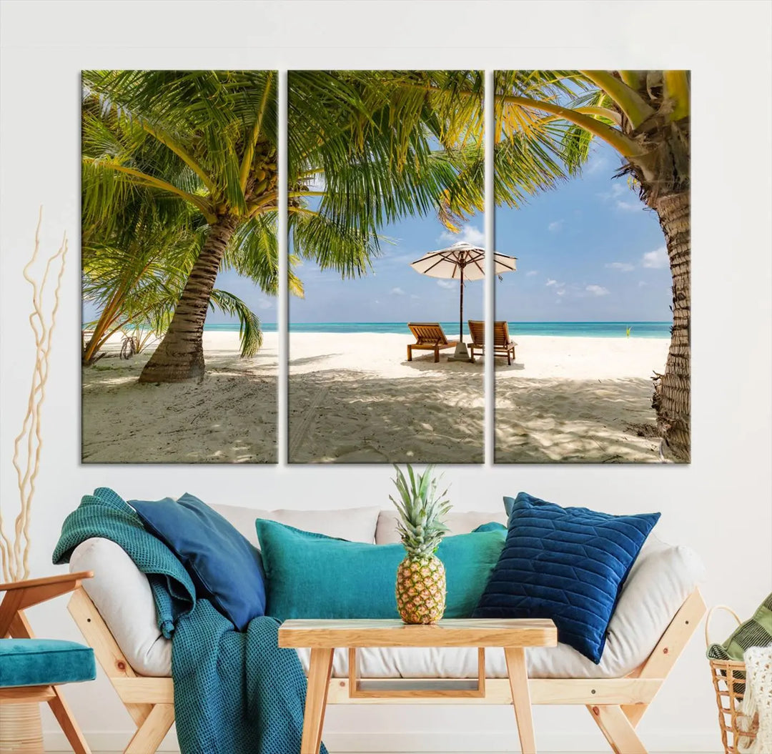 The living room features the "Lounge Chairs Palm Trees on Tropical Beach" canvas wall art print, offering museum-quality craftsmanship.