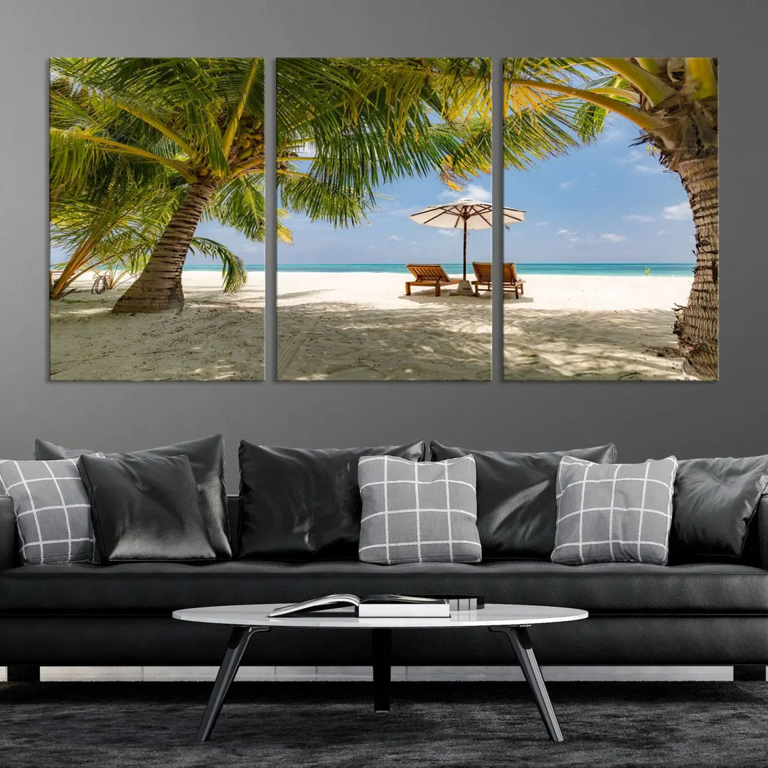 The living room features the "Lounge Chairs Palm Trees on Tropical Beach" canvas wall art print, offering museum-quality craftsmanship.