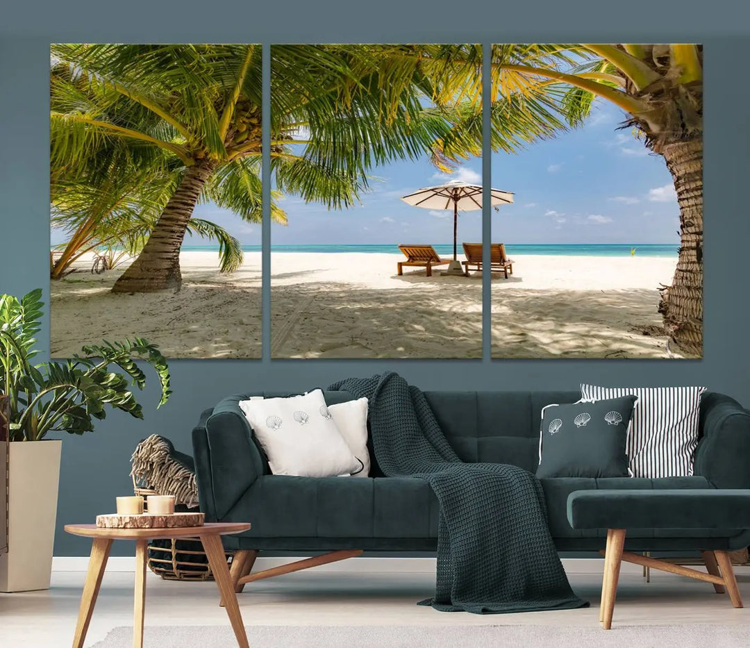 The living room features the "Lounge Chairs Palm Trees on Tropical Beach" canvas wall art print, offering museum-quality craftsmanship.