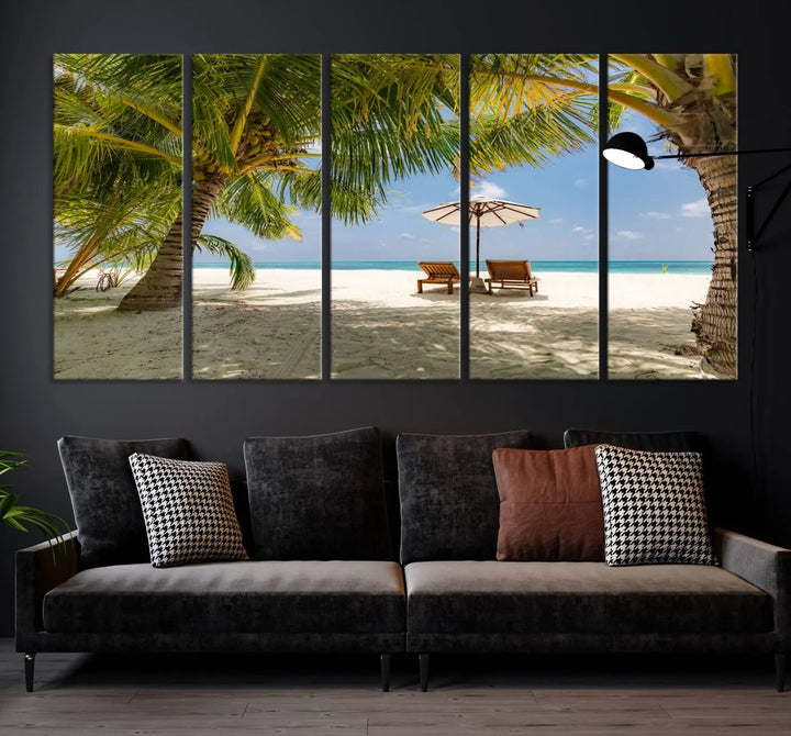 The living room features the "Lounge Chairs Palm Trees on Tropical Beach" canvas wall art print, offering museum-quality craftsmanship.