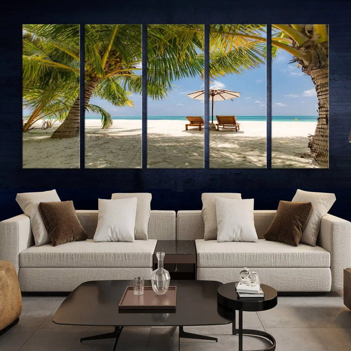 The living room features the "Lounge Chairs Palm Trees on Tropical Beach" canvas wall art print, offering museum-quality craftsmanship.