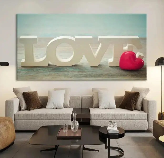 The Love Wall Art Canvas Print features the word "LOVE" in white block letters next to a vibrant red heart, enhanced with a UV-protective coating for durability. This piece adds enduring elegance and is crafted from museum-quality canvas, available with free shipping.