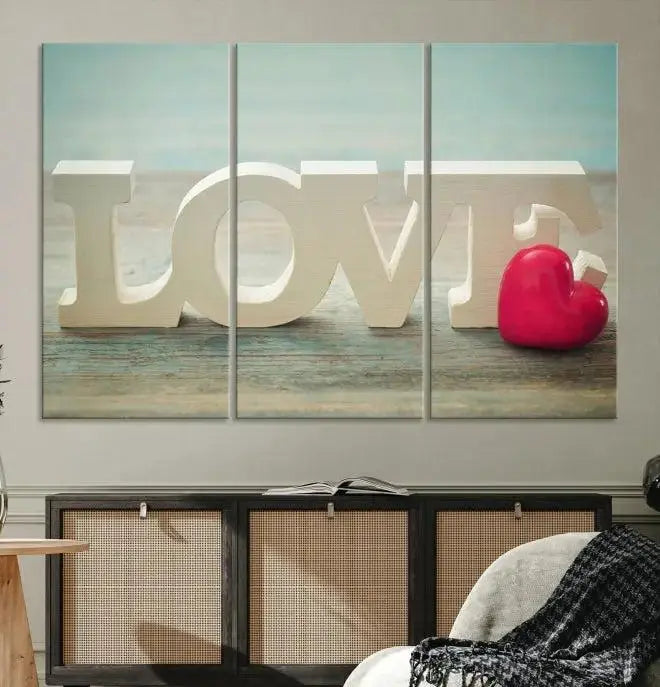 The Love Wall Art Canvas Print features the word "LOVE" in white block letters next to a vibrant red heart, enhanced with a UV-protective coating for durability. This piece adds enduring elegance and is crafted from museum-quality canvas, available with free shipping.