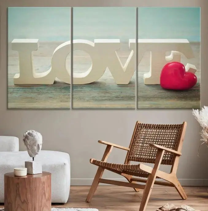 The Love Wall Art Canvas Print features the word "LOVE" in white block letters next to a vibrant red heart, enhanced with a UV-protective coating for durability. This piece adds enduring elegance and is crafted from museum-quality canvas, available with free shipping.