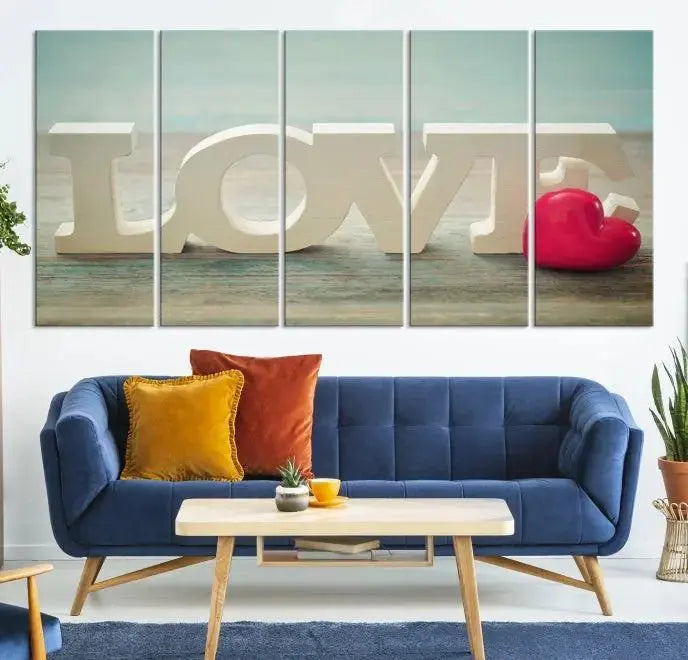 The Love Wall Art Canvas Print features the word "LOVE" in white block letters next to a vibrant red heart, enhanced with a UV-protective coating for durability. This piece adds enduring elegance and is crafted from museum-quality canvas, available with free shipping.