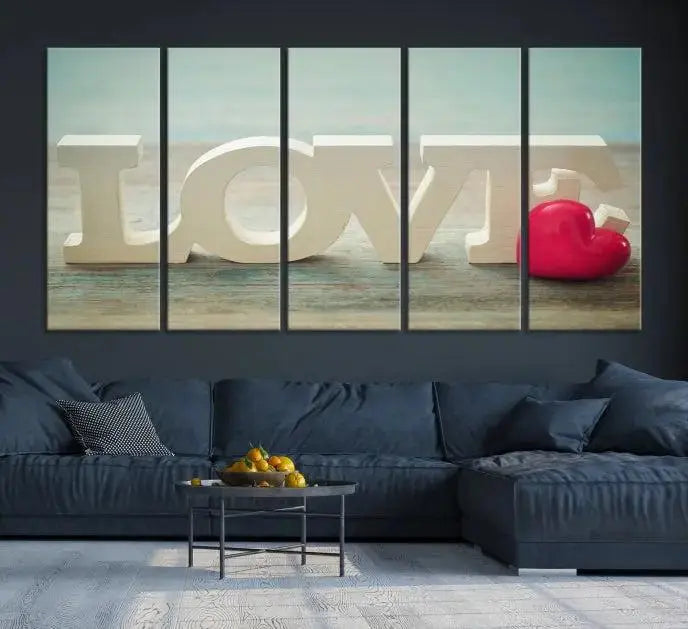 The Love Wall Art Canvas Print features the word "LOVE" in white block letters next to a vibrant red heart, enhanced with a UV-protective coating for durability. This piece adds enduring elegance and is crafted from museum-quality canvas, available with free shipping.