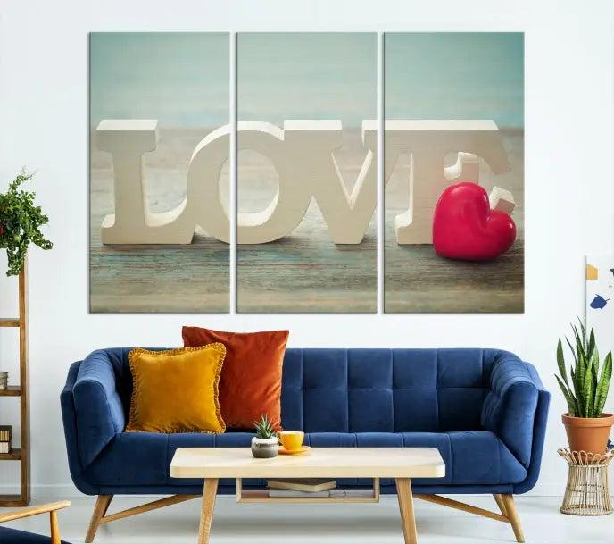 The Love Wall Art Canvas Print features the word "LOVE" in white block letters next to a vibrant red heart, enhanced with a UV-protective coating for durability. This piece adds enduring elegance and is crafted from museum-quality canvas, available with free shipping.