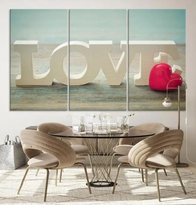 The Love Wall Art Canvas Print features the word "LOVE" in white block letters next to a vibrant red heart, enhanced with a UV-protective coating for durability. This piece adds enduring elegance and is crafted from museum-quality canvas, available with free shipping.