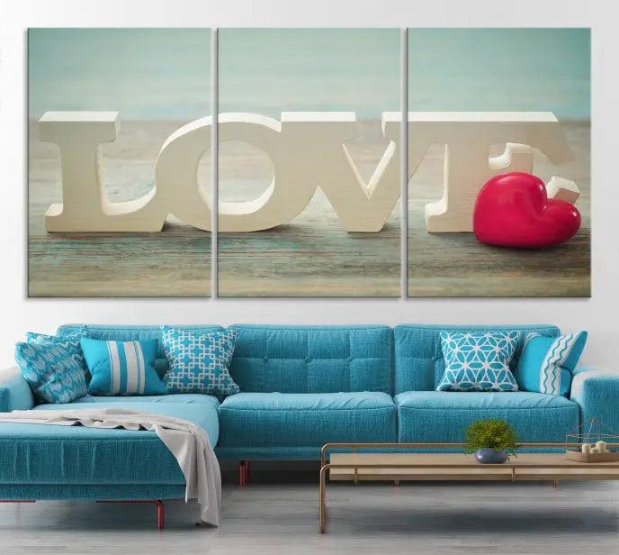 The Love Wall Art Canvas Print features the word "LOVE" in white block letters next to a vibrant red heart, enhanced with a UV-protective coating for durability. This piece adds enduring elegance and is crafted from museum-quality canvas, available with free shipping.